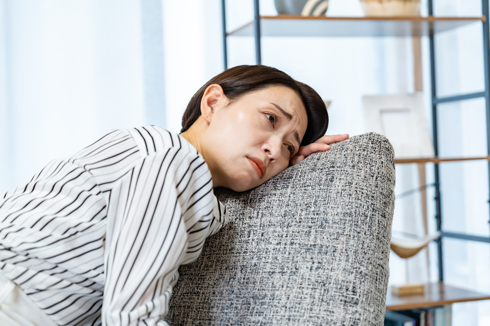 骨盤の歪みによってもたらされる身体の不調に悩んでいる女性